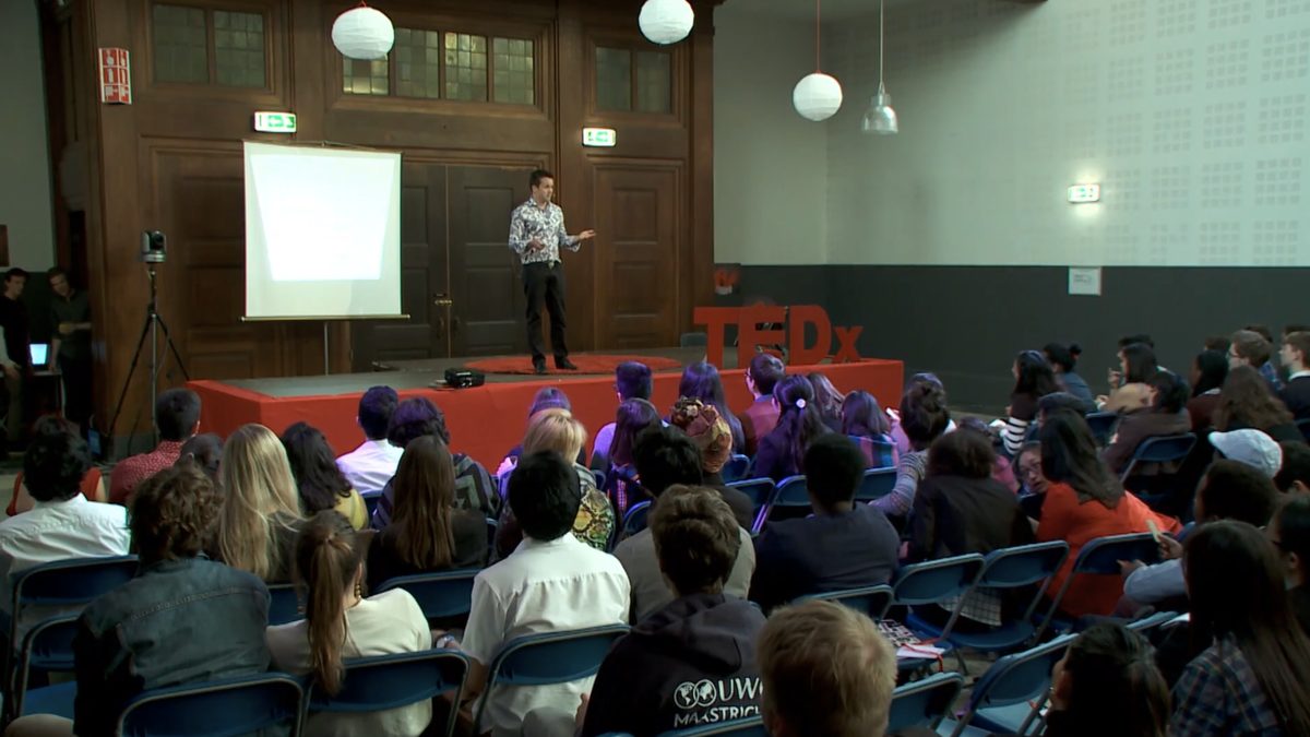 David Jenyns speaking on the TEDx stage